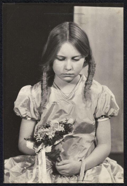Vintage Portrait of Girl Holding Bouquet