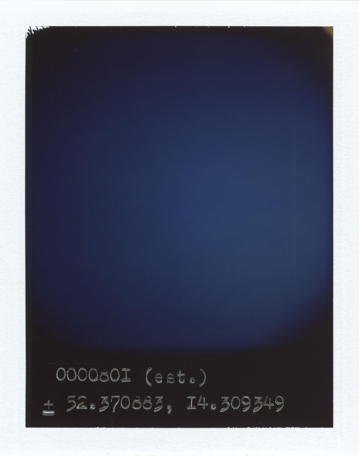 Handwritten Coordinates on Dark Blue Background