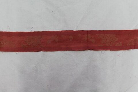 Red Patterned Textile Fragment