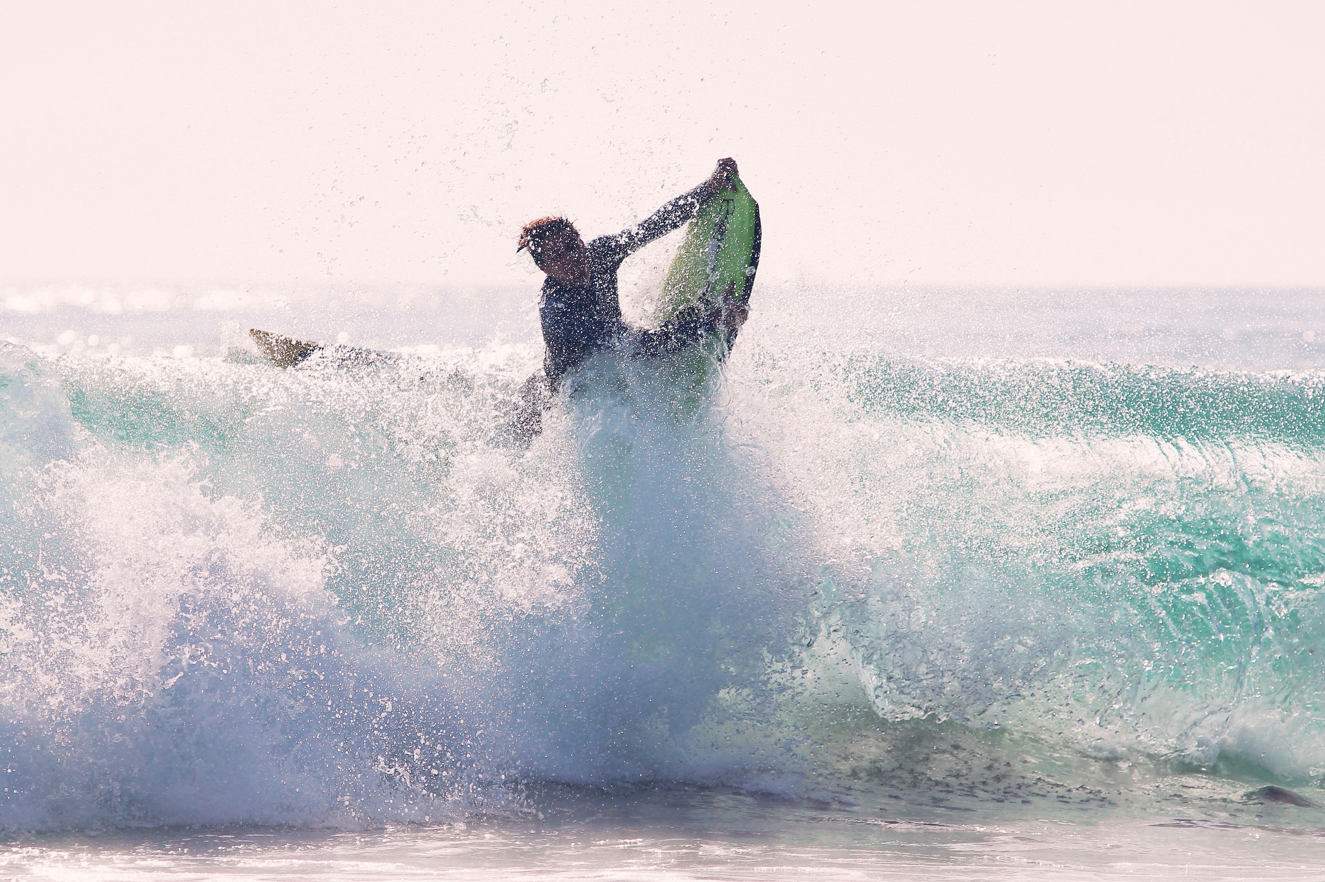 Surfer Riding Ocean Wave