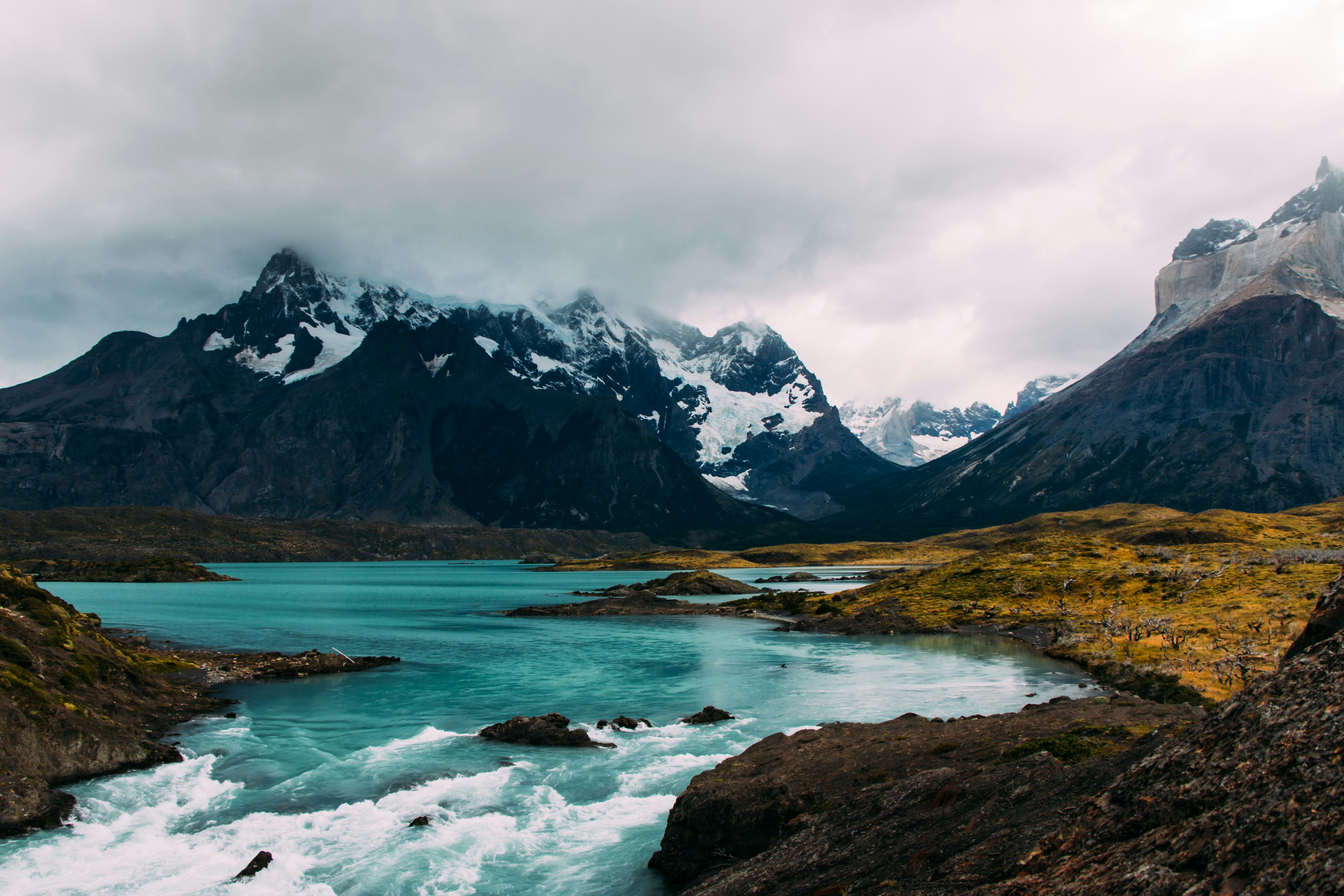 Glacial Lake and Snowy Mountain Landscape