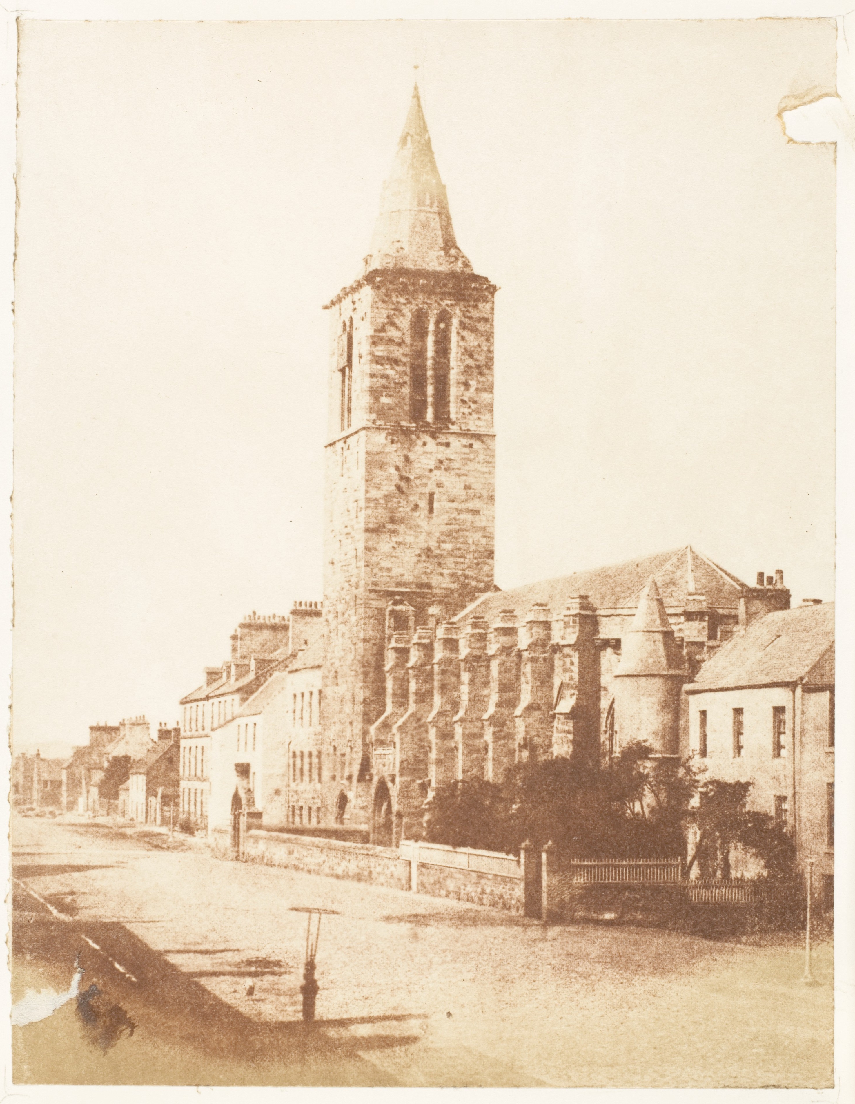 Vintage Street View with Stone Church Tower