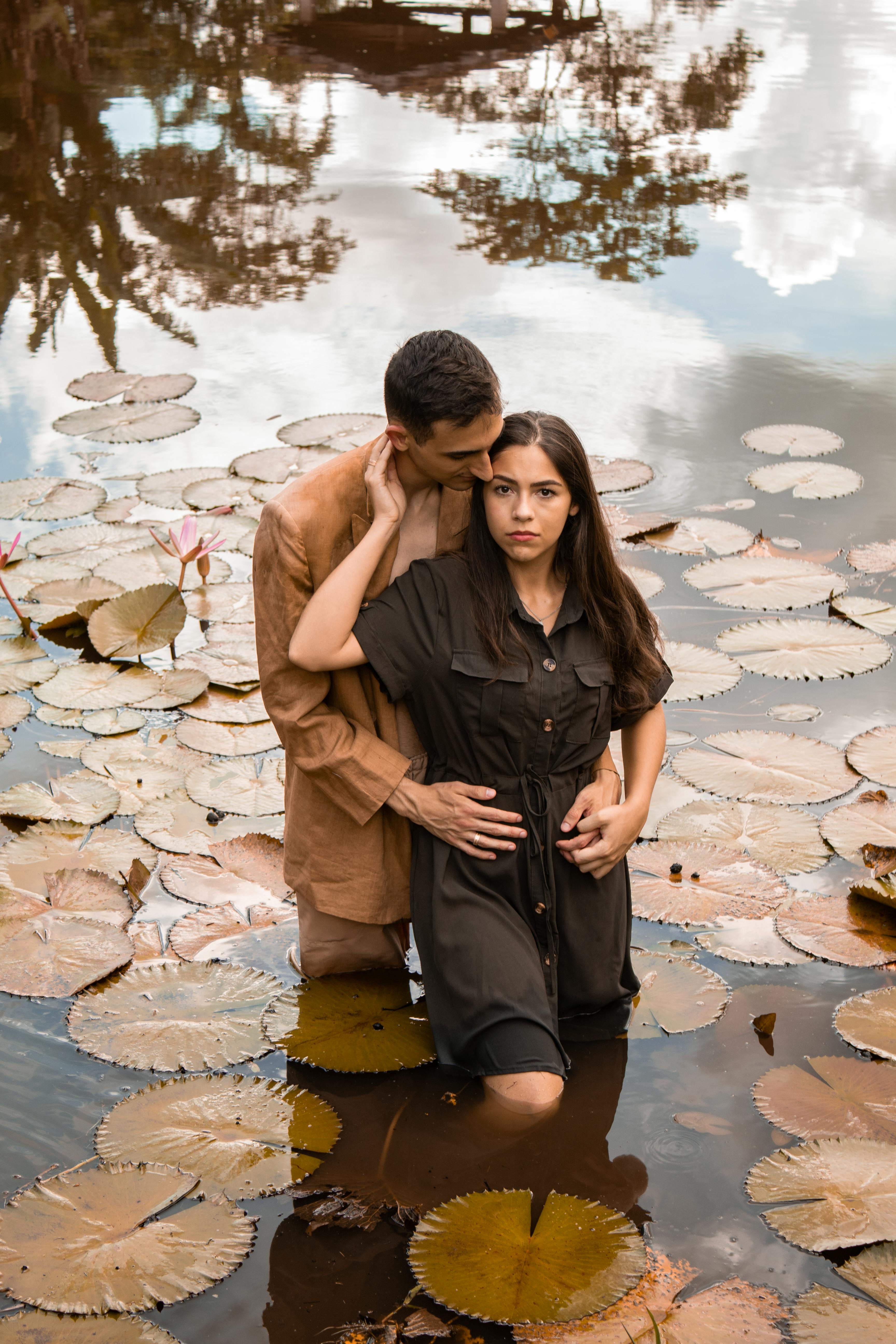 Couple In Lily Pond