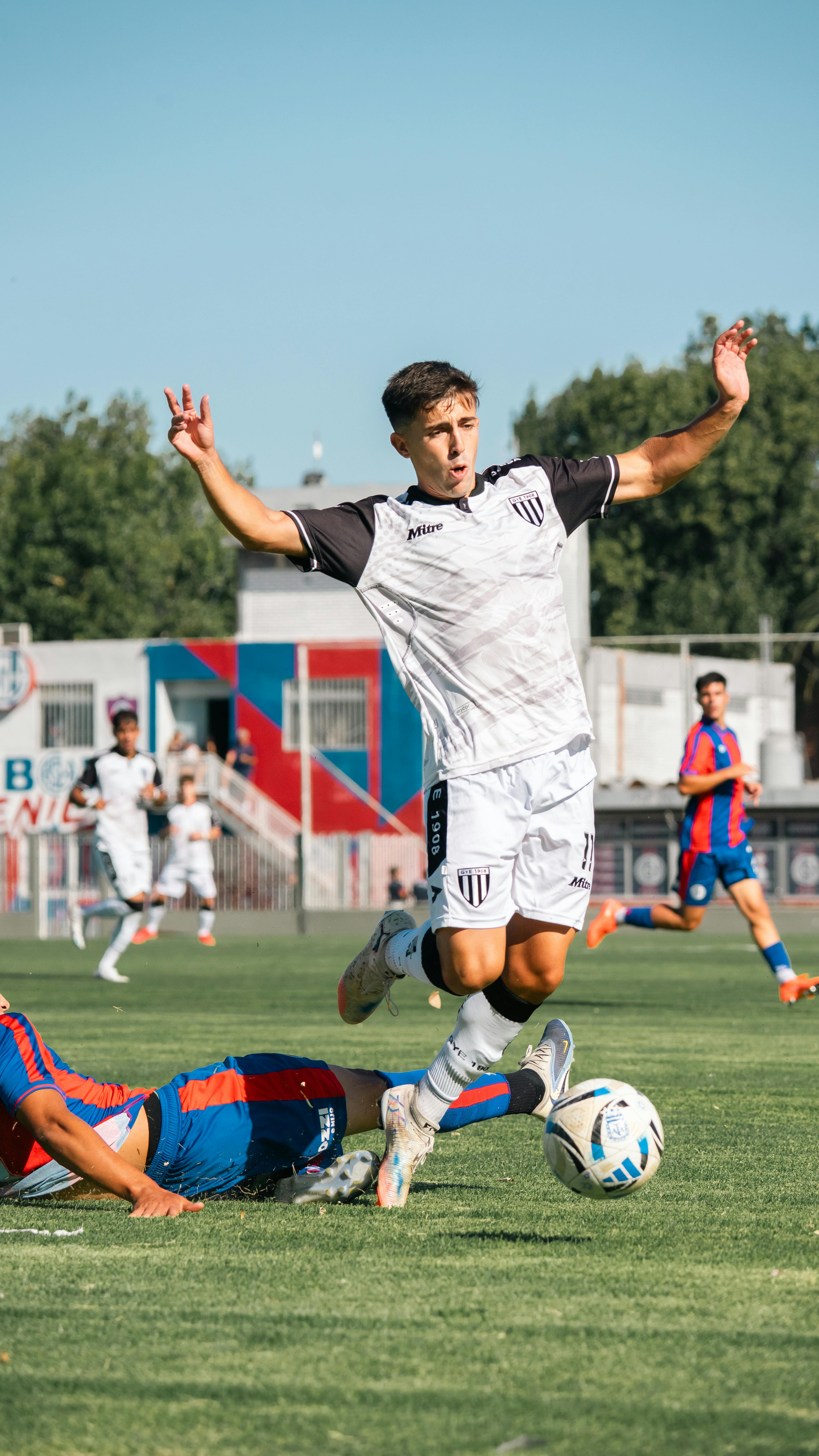 Soccer Match Tackle Action