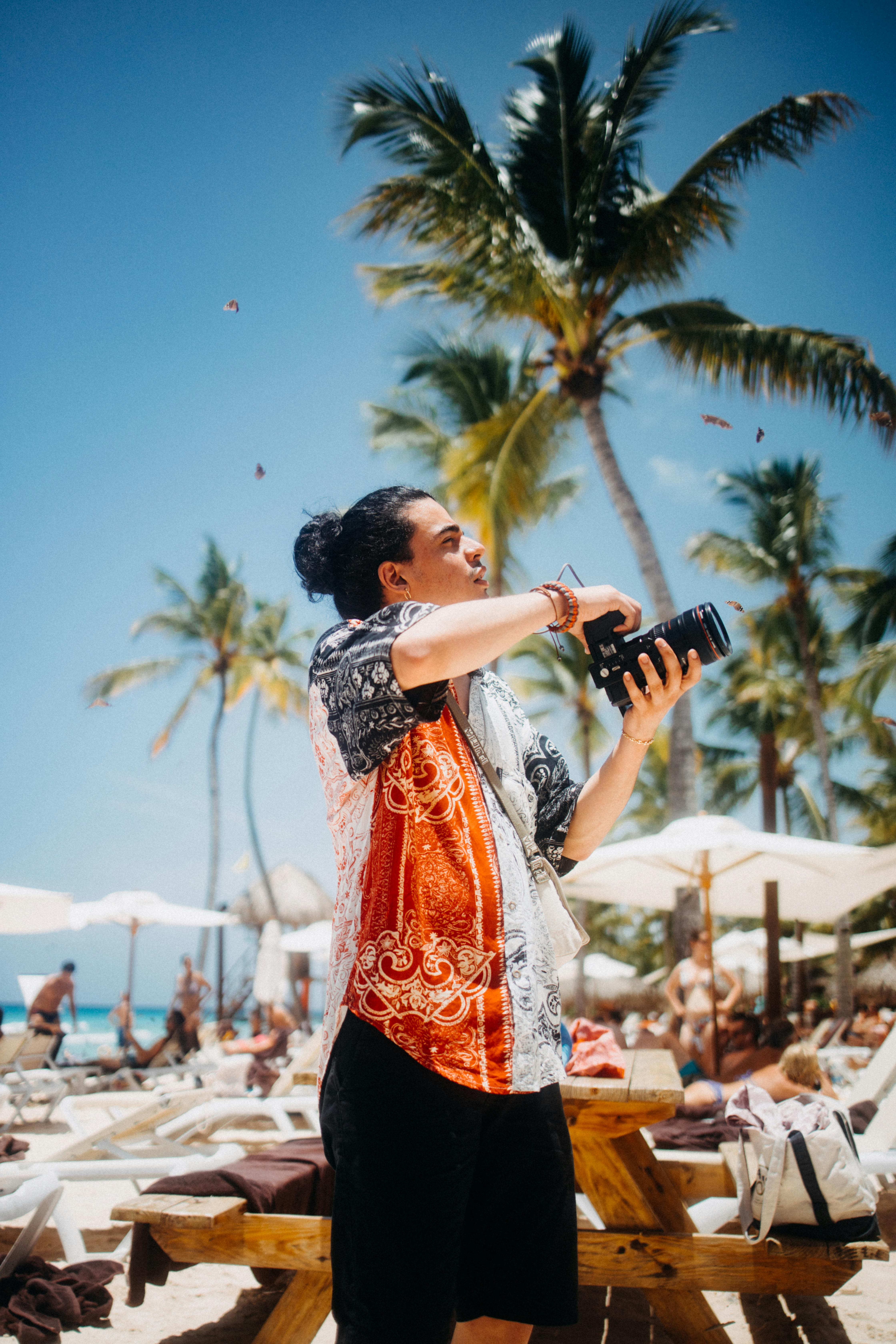 Photographer Shooting on Tropical Beach