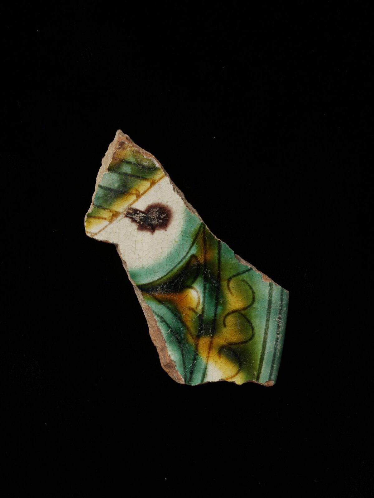 Tri-color glazed ceramic shard