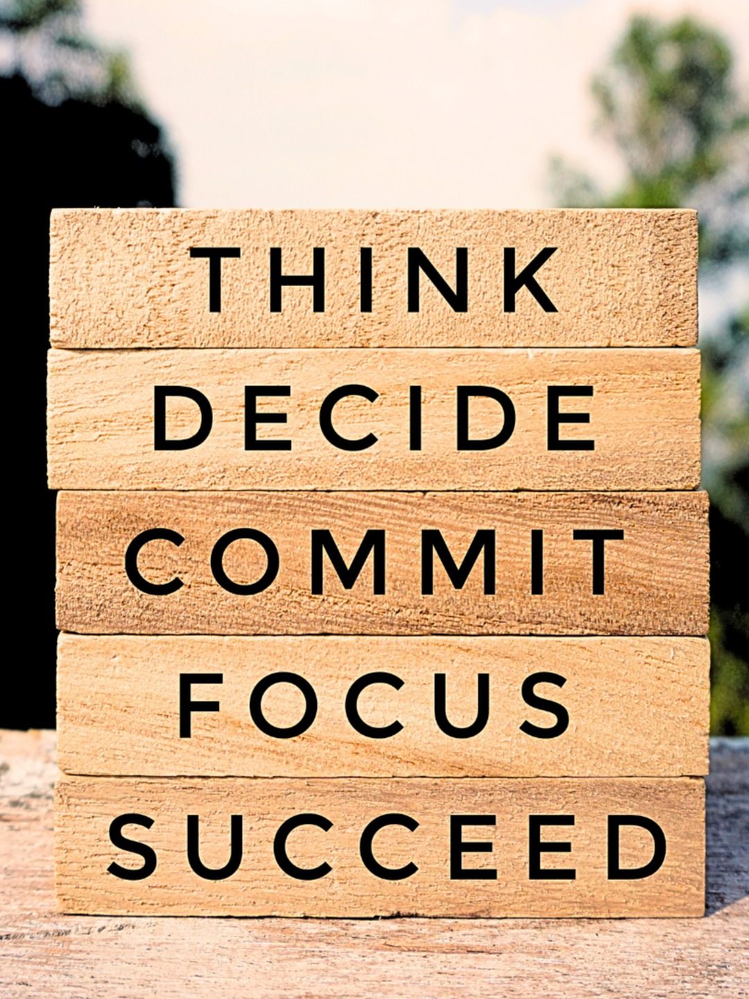 Motivational Words on Stacked Wooden Blocks