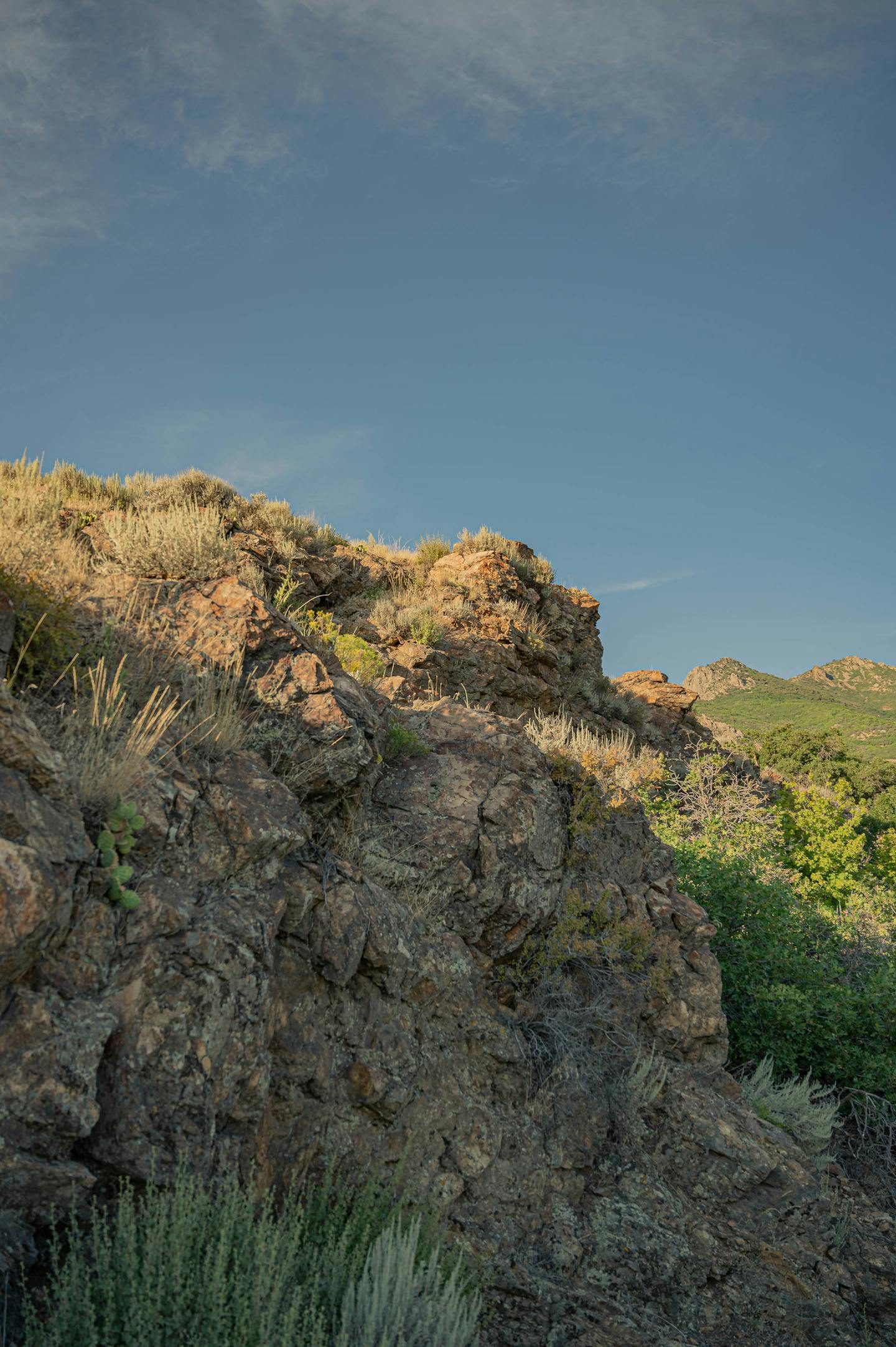 Rocky Hillside Under Clear Blue Sky