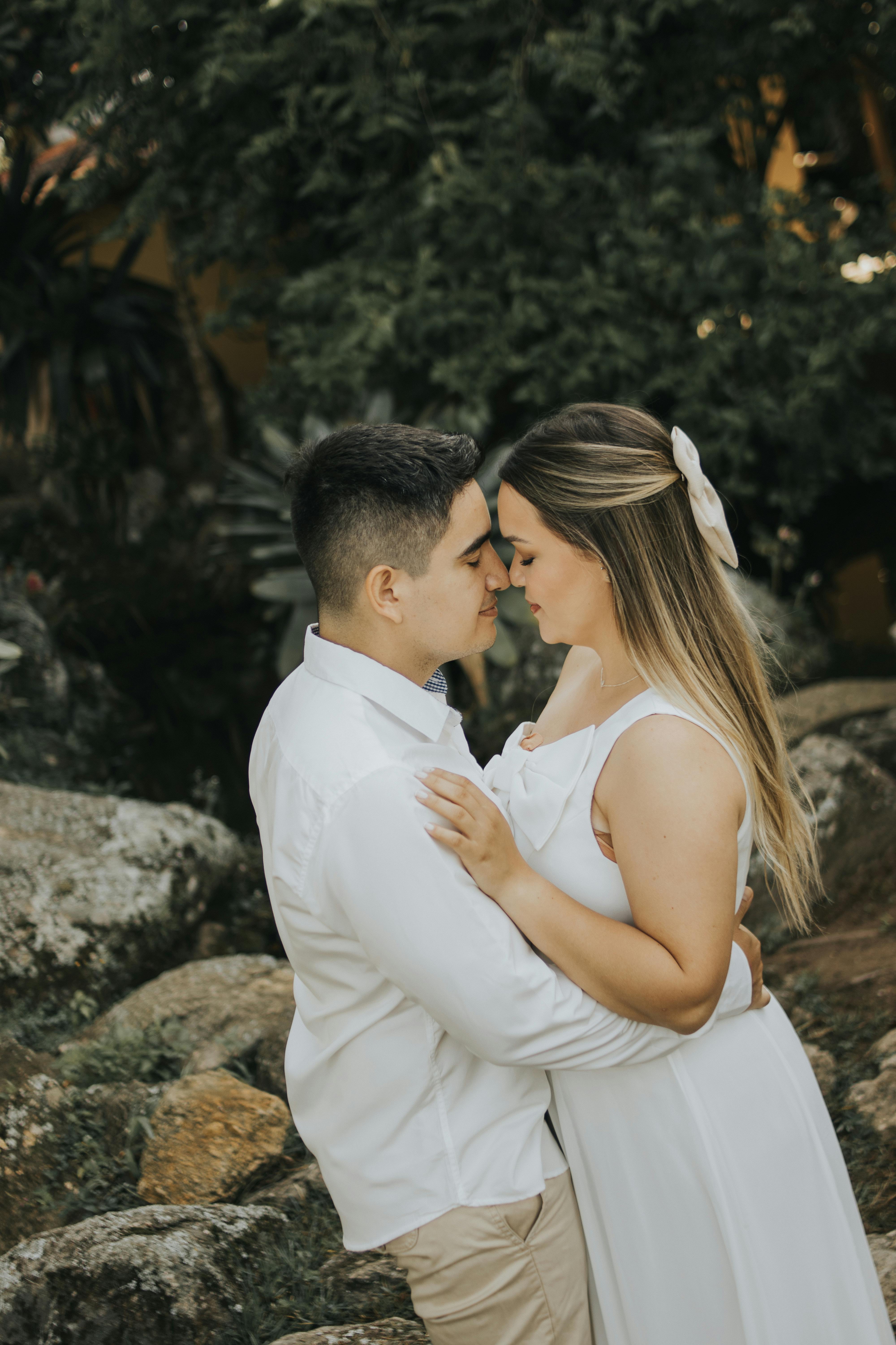 Engaged Couple Embracing Outdoors