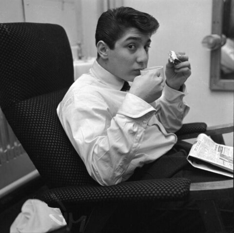 Young Man With Coffee and Cigarette
