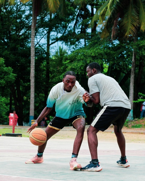 Two Men Playing Outdoor Basketball