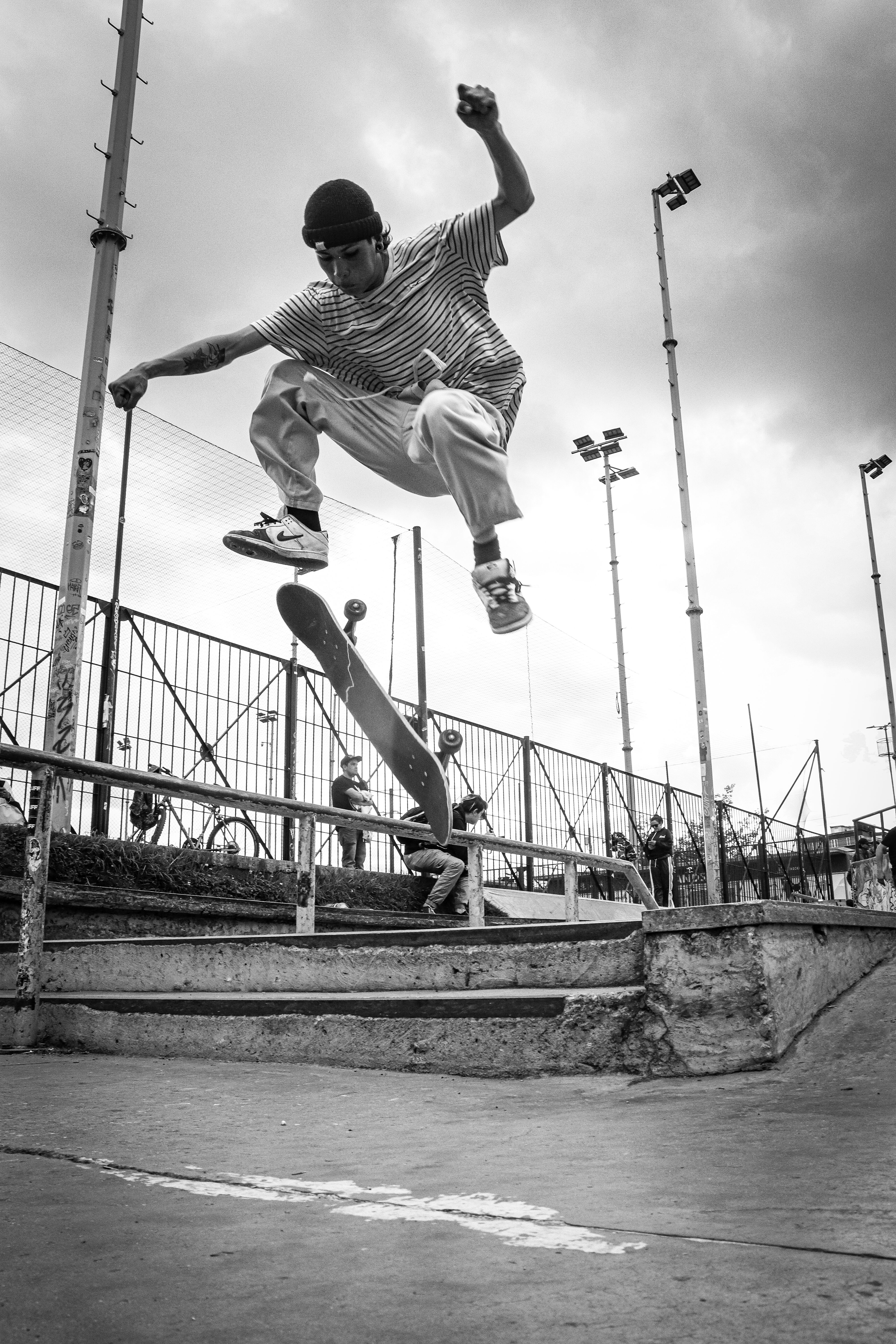Skateboarder Performing Trick At Skatepark