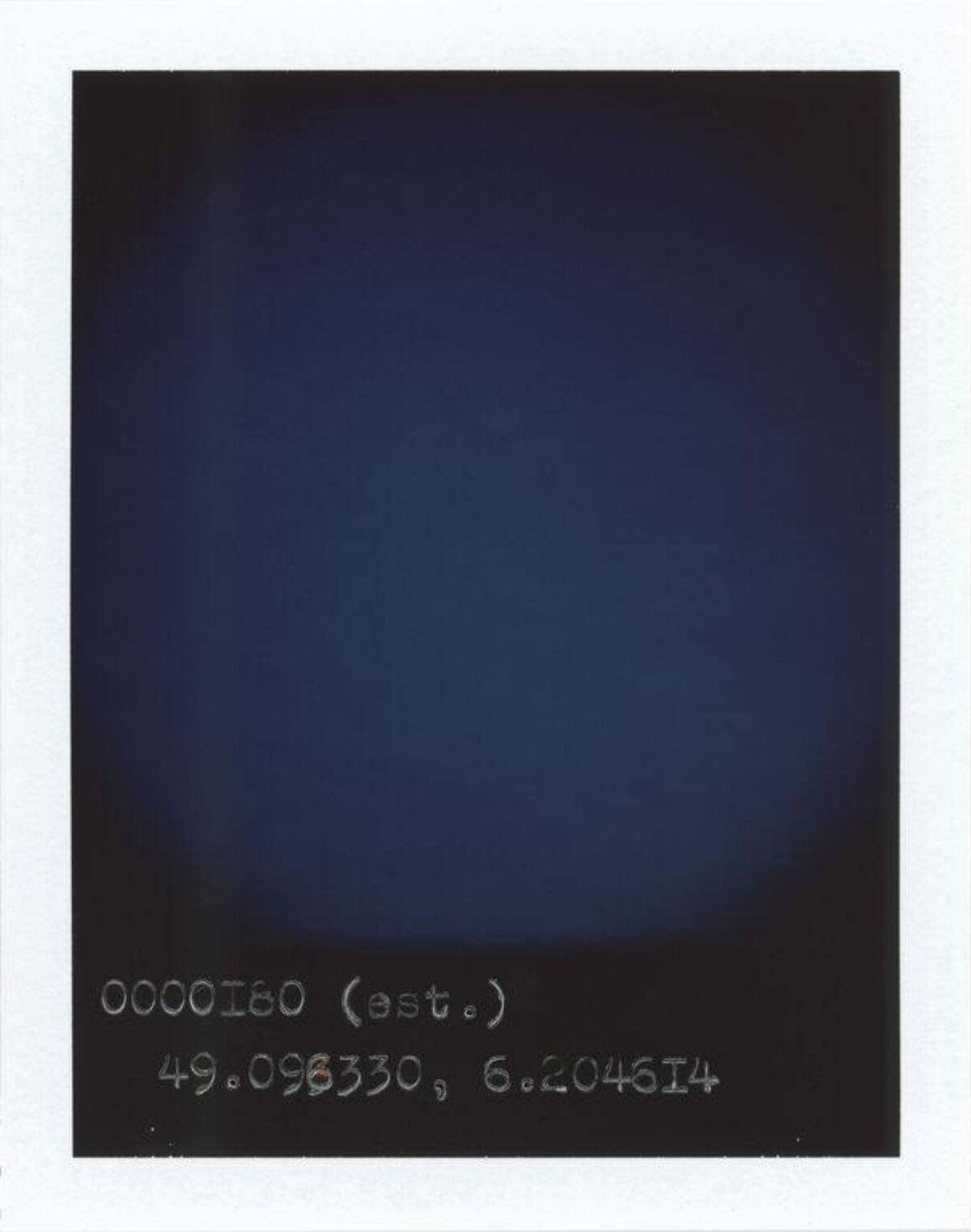 Polaroid with Handwritten Coordinates