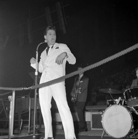 Male Singer Performing on Stage