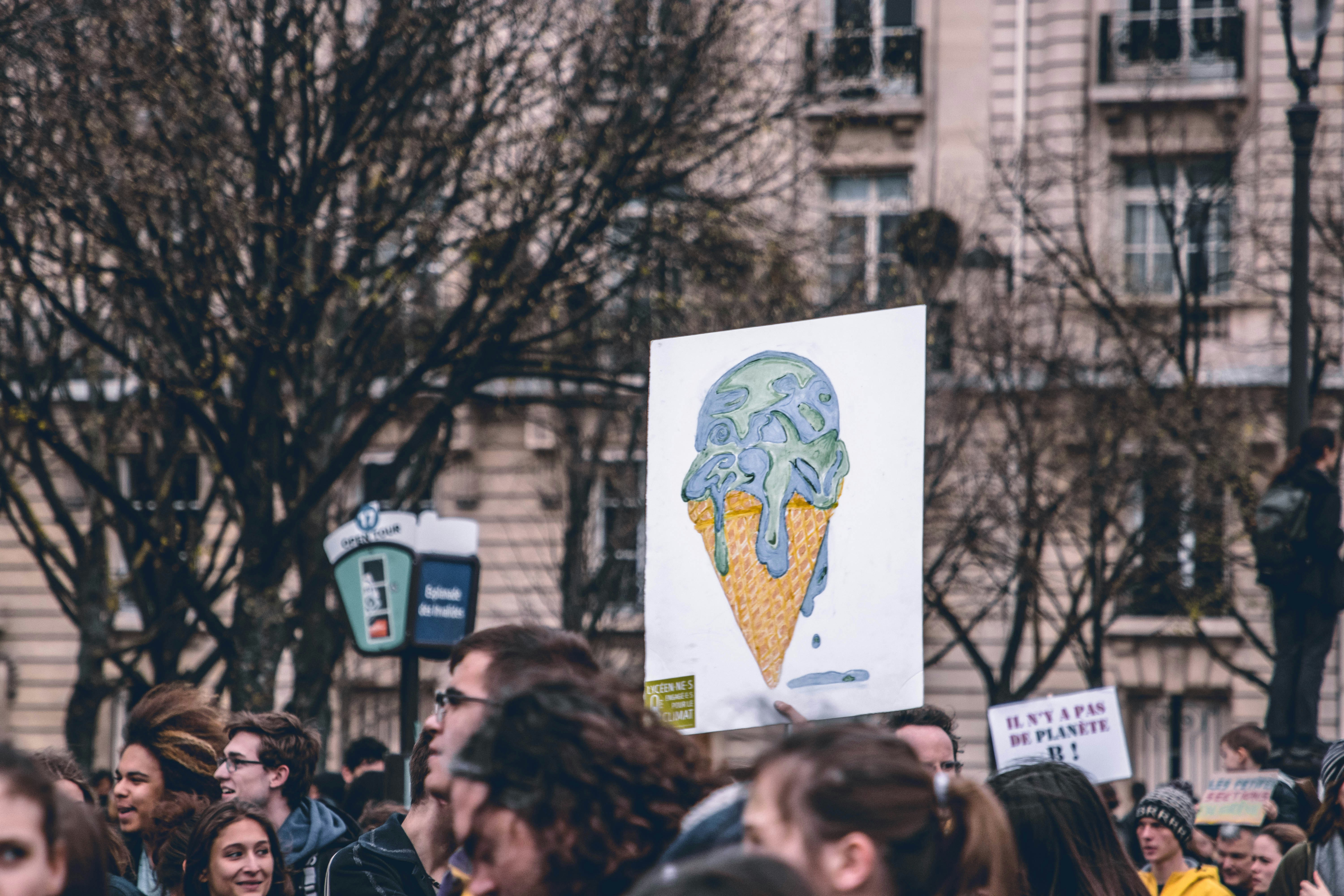 Climate Protest With Melting Ice Cream Sign