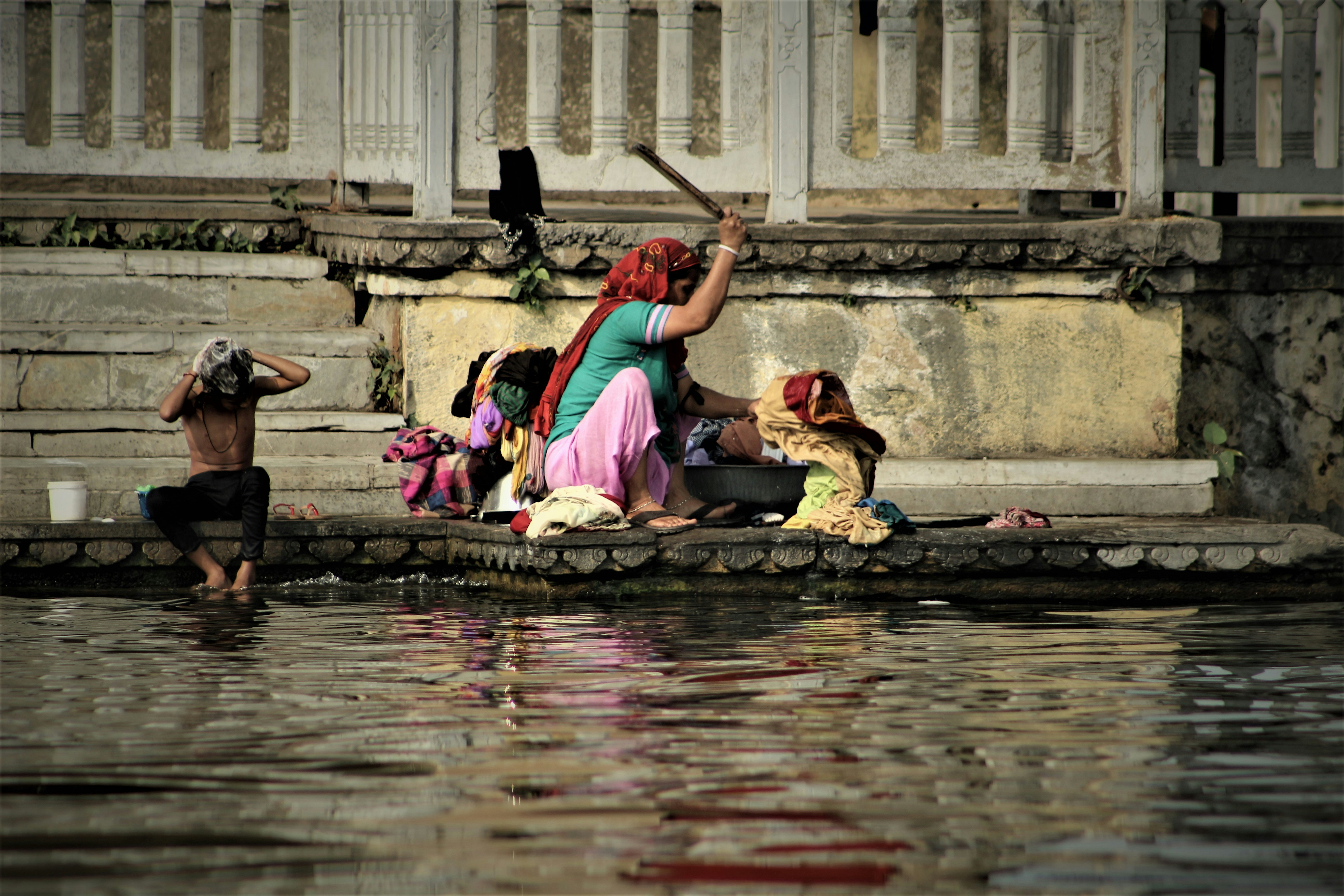 Washing Clothes by Waterfront Steps