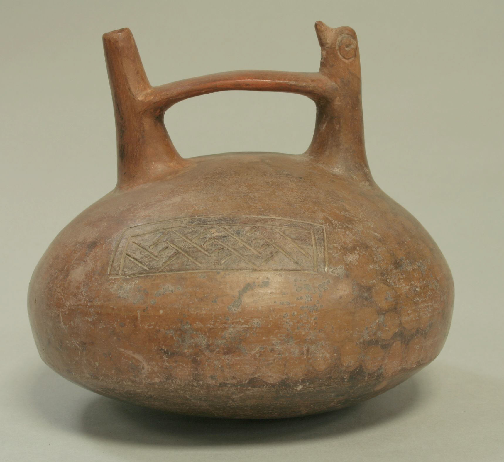 Ancient Bird-headed Handled Pottery Vessel