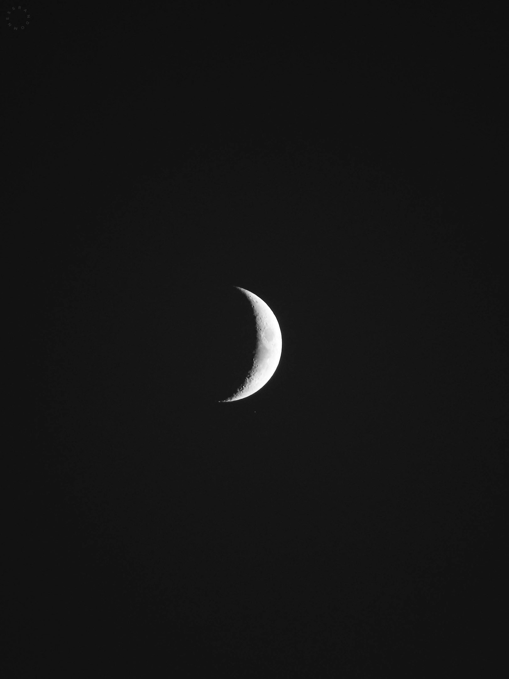 Crescent Moon in Dark Night Sky