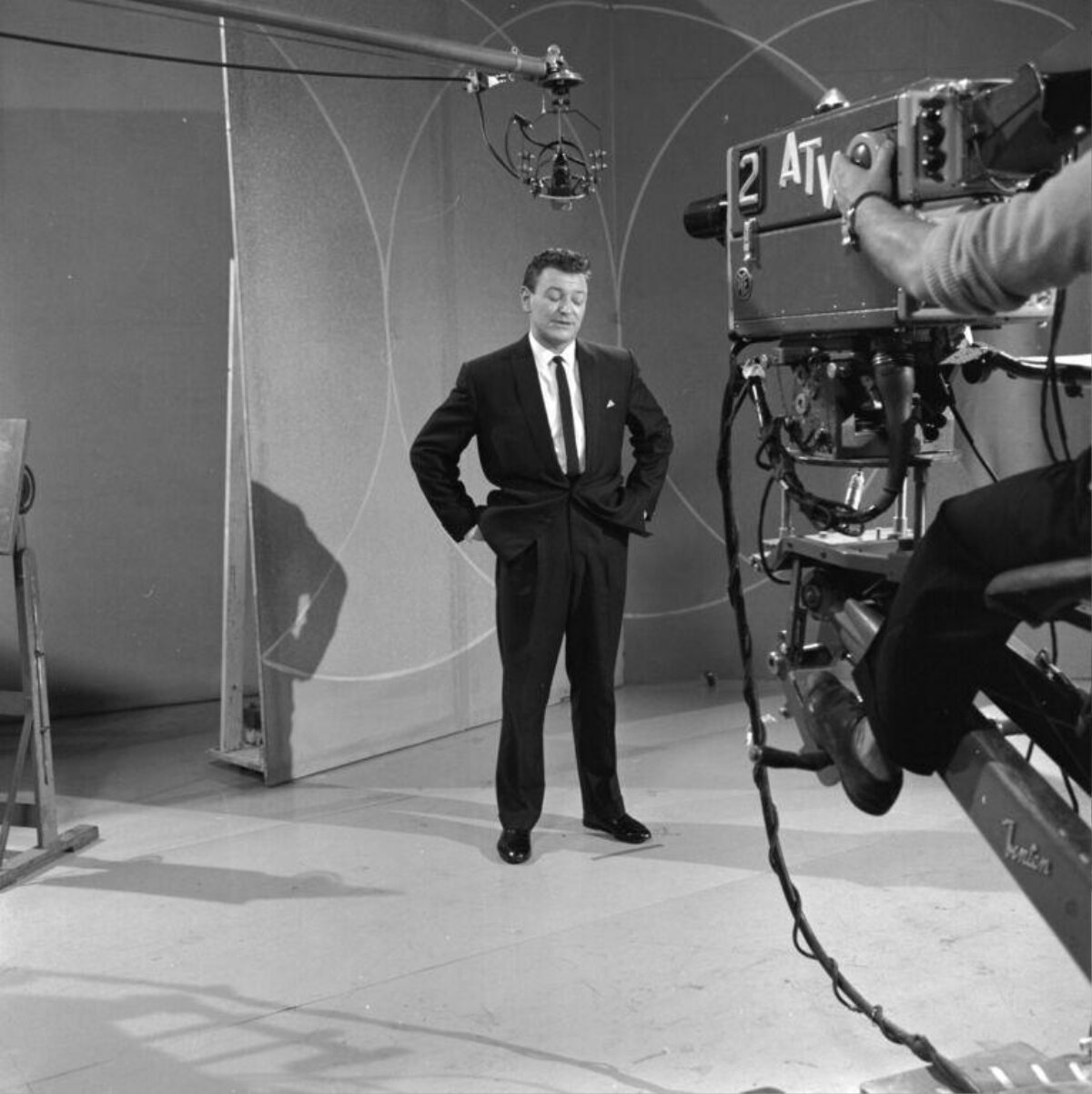 Man on Vintage Television Studio Set