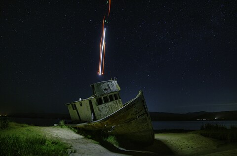 Abandoned Ship Under Starry Night Sky