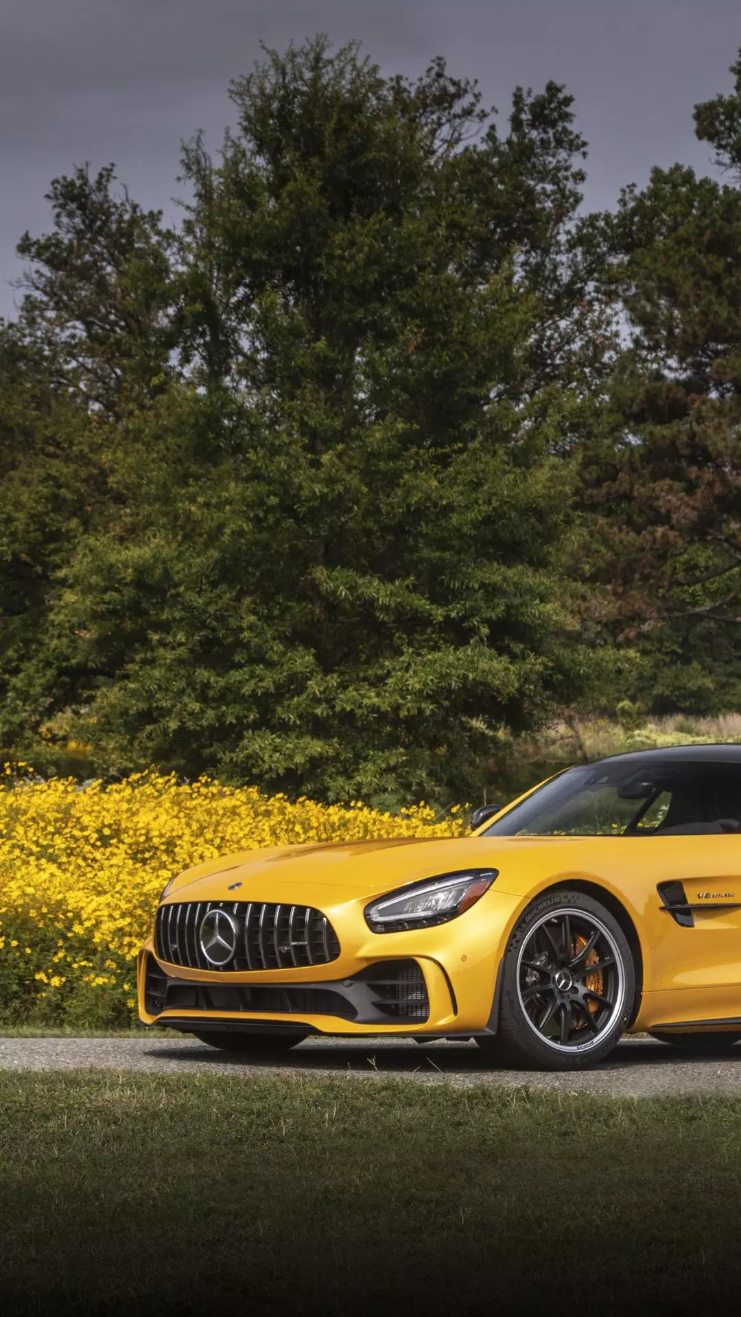 Yellow Mercedes AMG Sports Car Outdoors