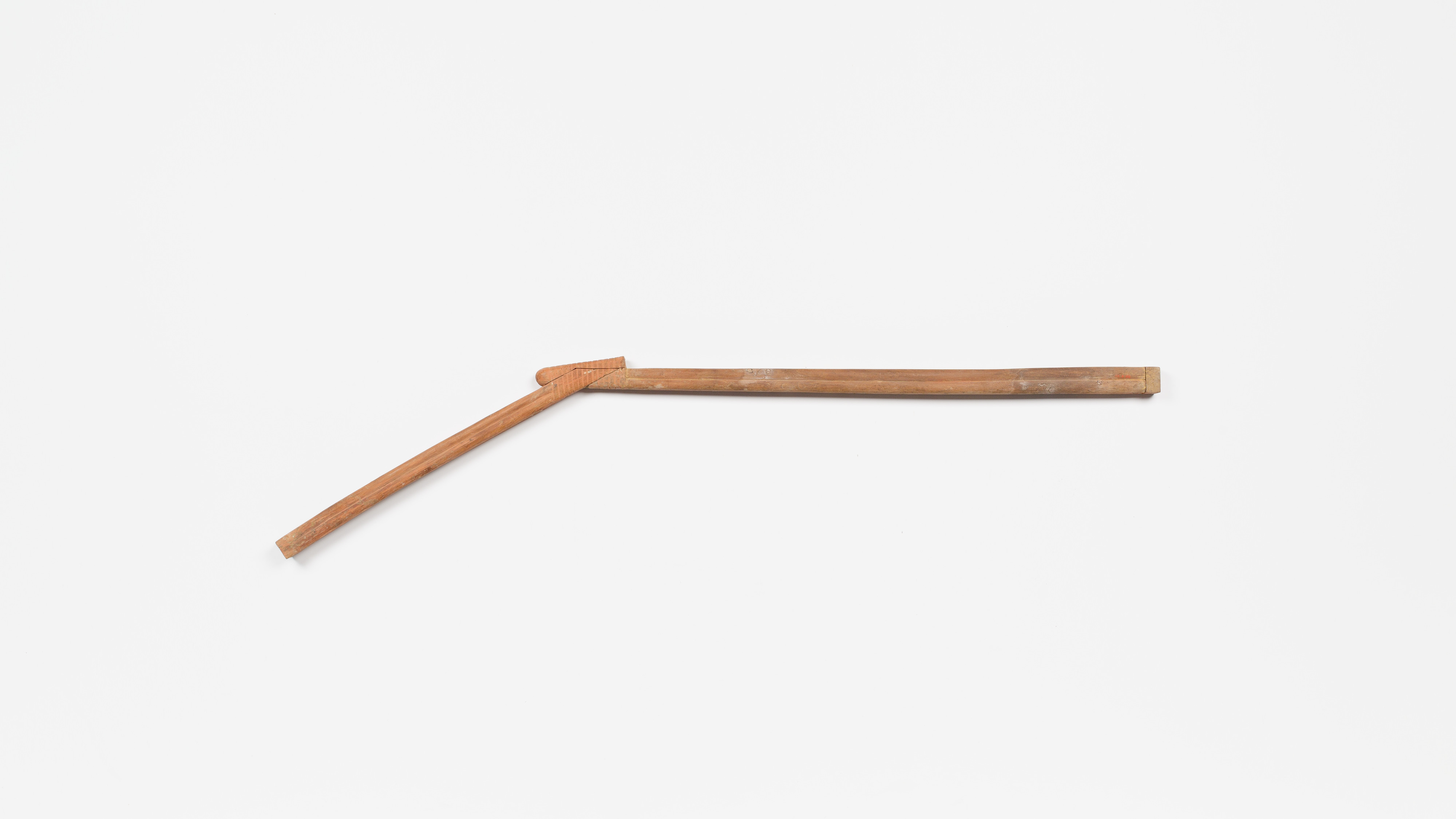 Bent Wooden Hand Tool on White Background — White Backgrounds