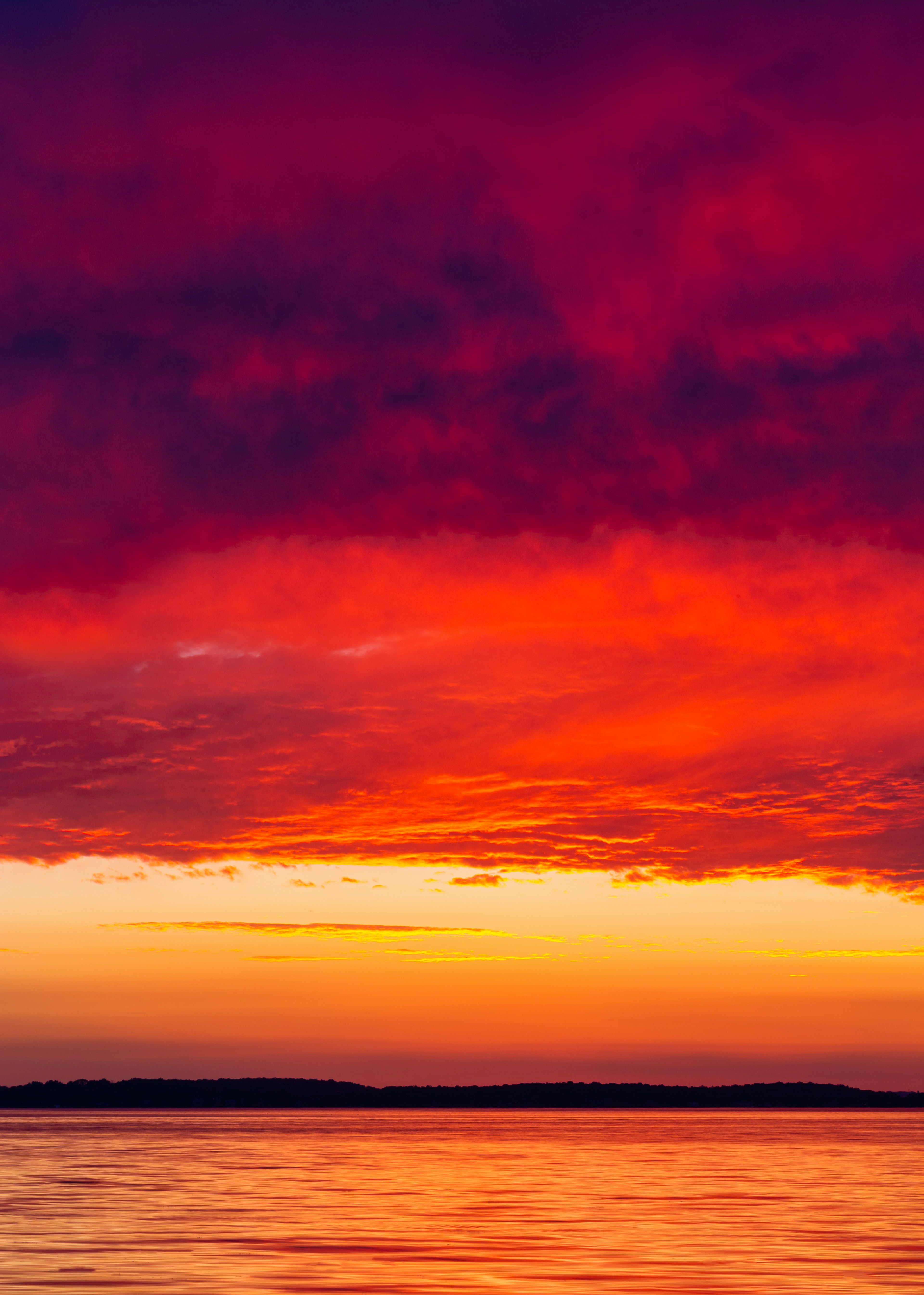 Fiery Sunset Over Open Water