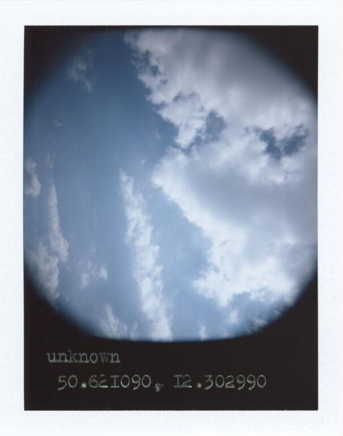 Blue Sky with Scattered White Clouds