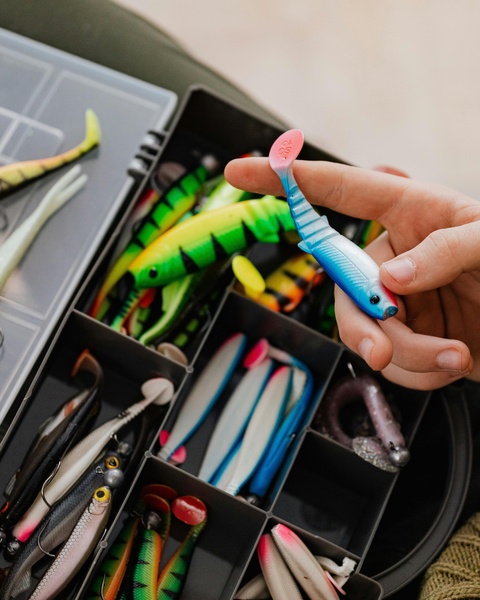 Hand Holding Soft Fishing Lure
