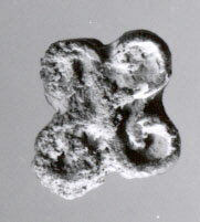 Four-lobed Microscopic Metal Particle