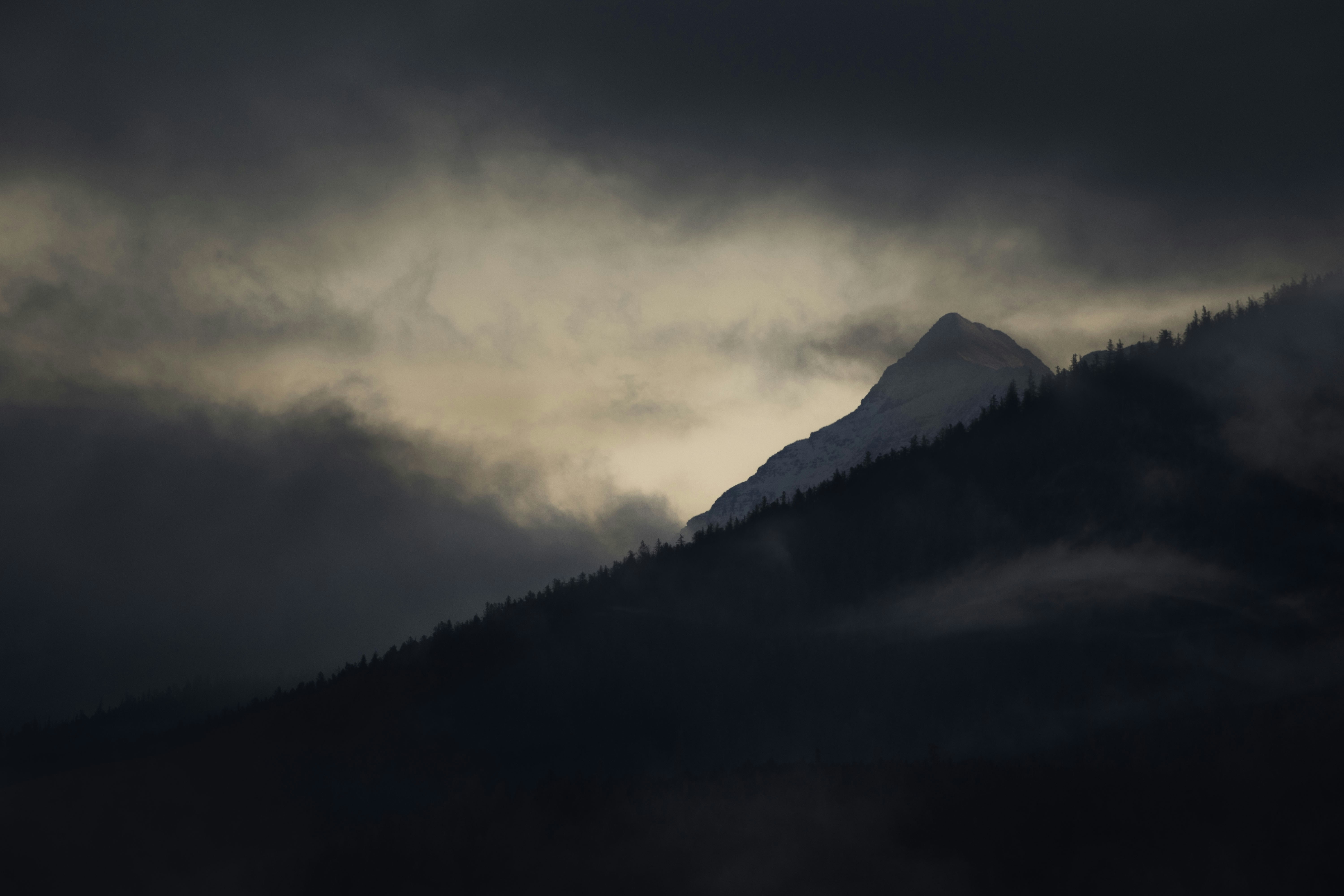 Misty Mountain with Sunlit Peak