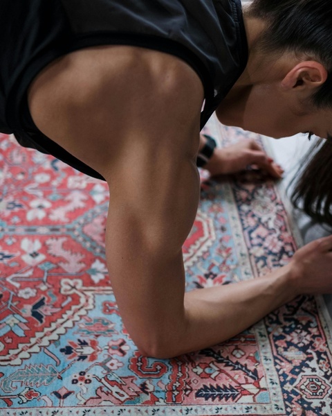Muscular Arm During Home Plank Workout