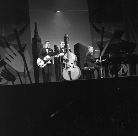 Three-man Band Performing on Stage