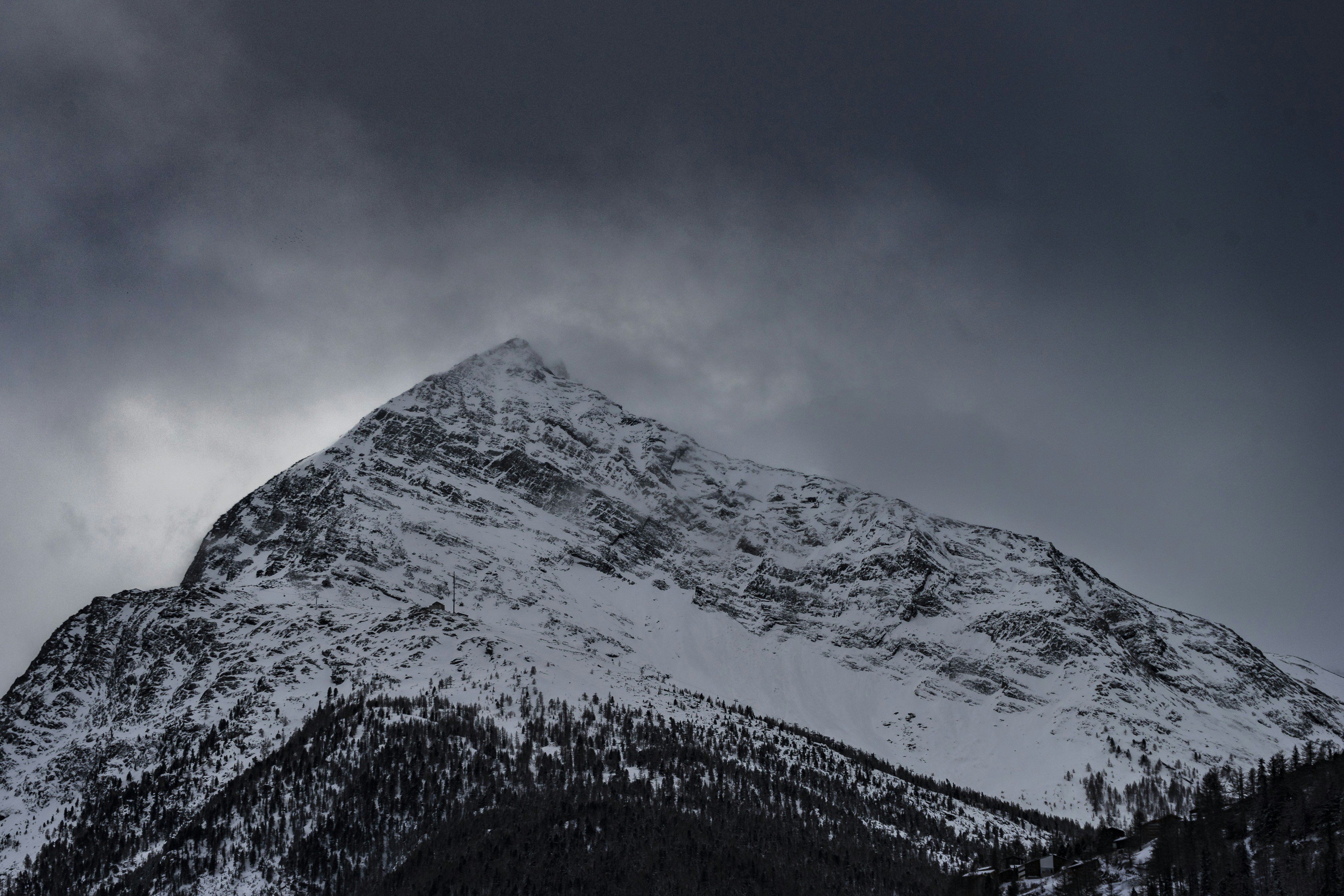 Cloudy Sky Over Snowy Mountain