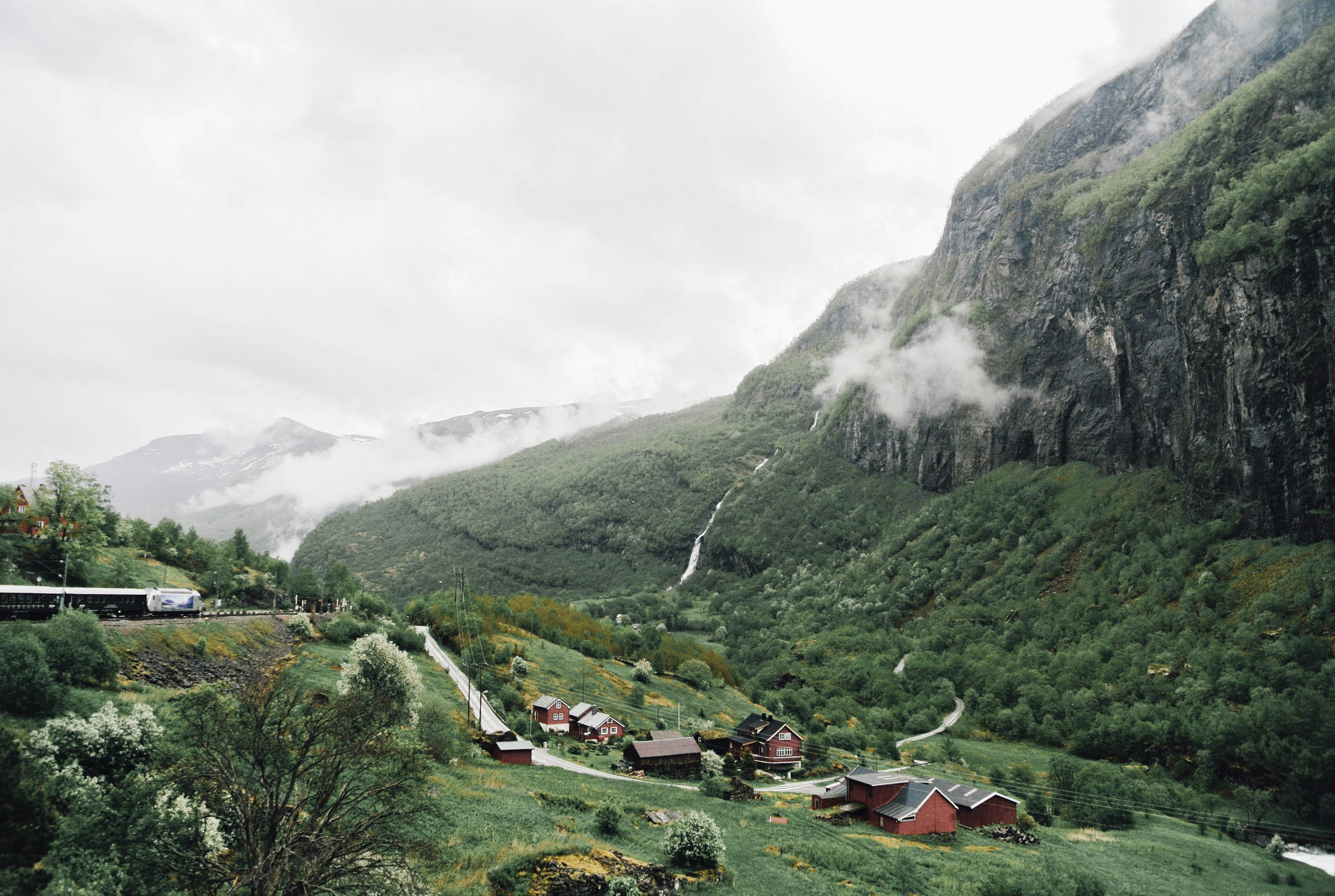 Misty Mountain Valley with Village and Train