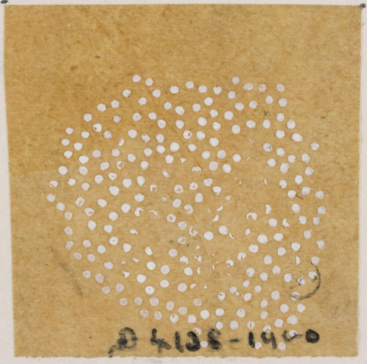 Perforated Circular Dot Pattern on Old Paper
