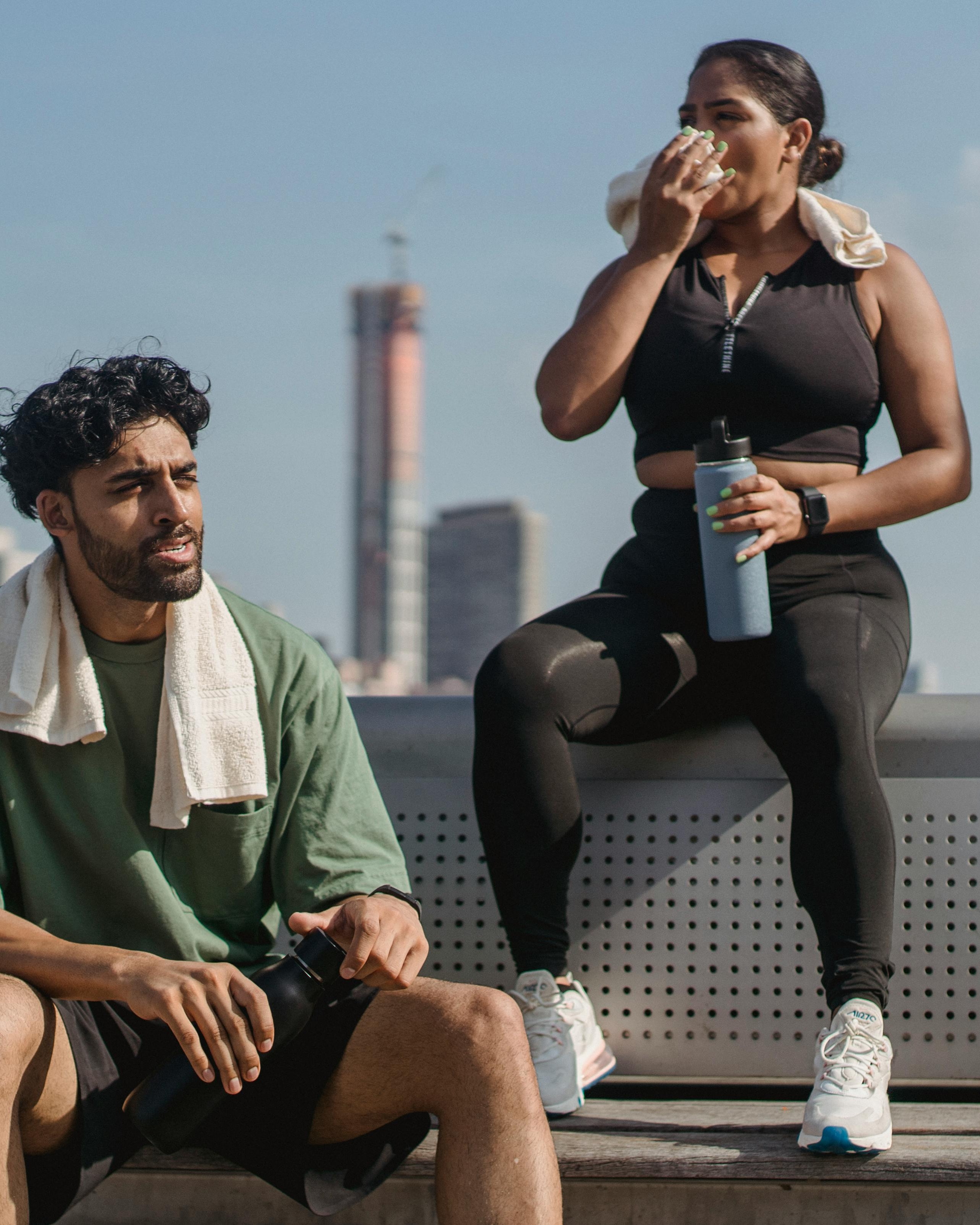 Two People Resting After Outdoor Workout