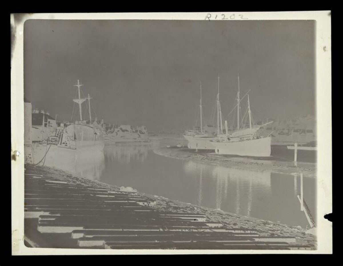 Vintage Harbor with Docked Sailing Ships