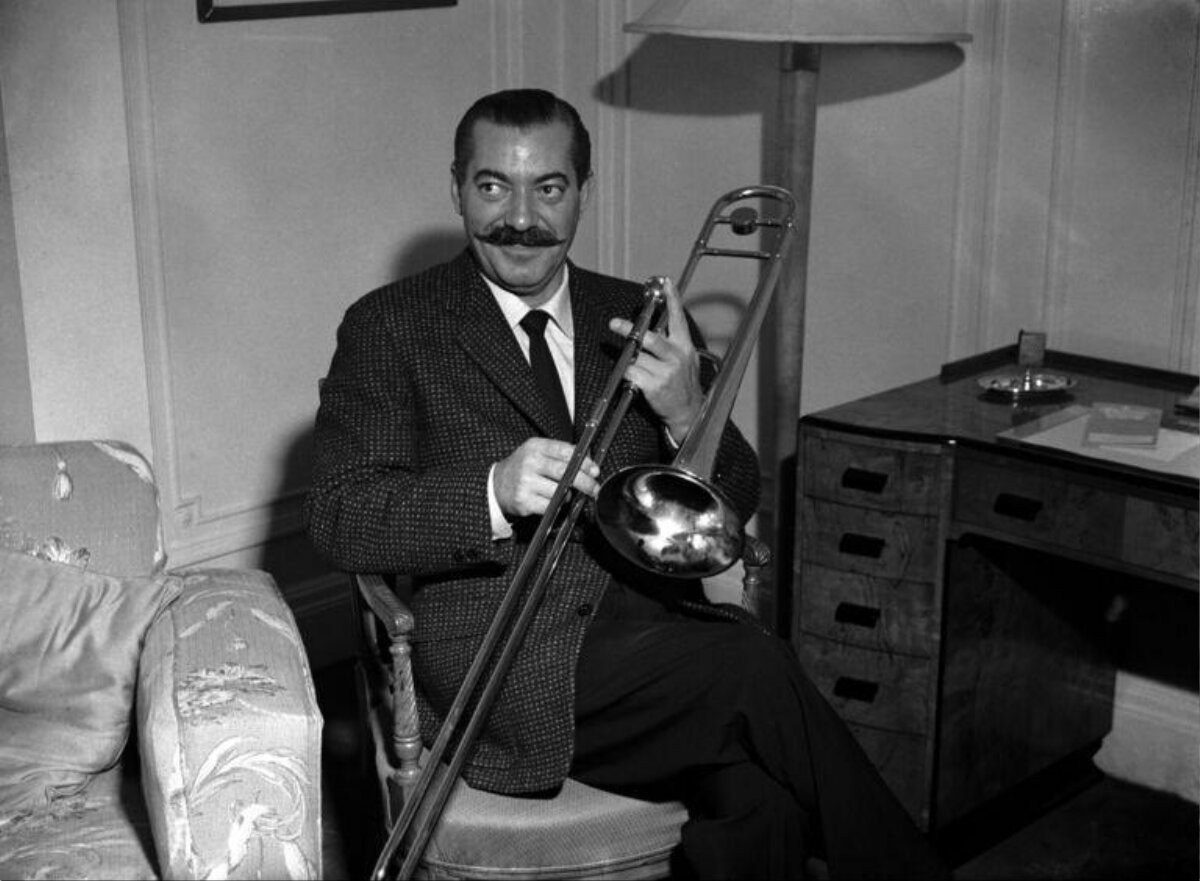 Seated Man Holding a Trombone