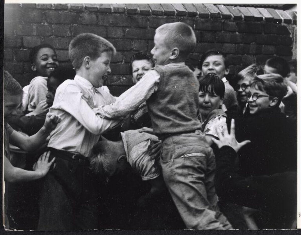 Boys playing tussle game