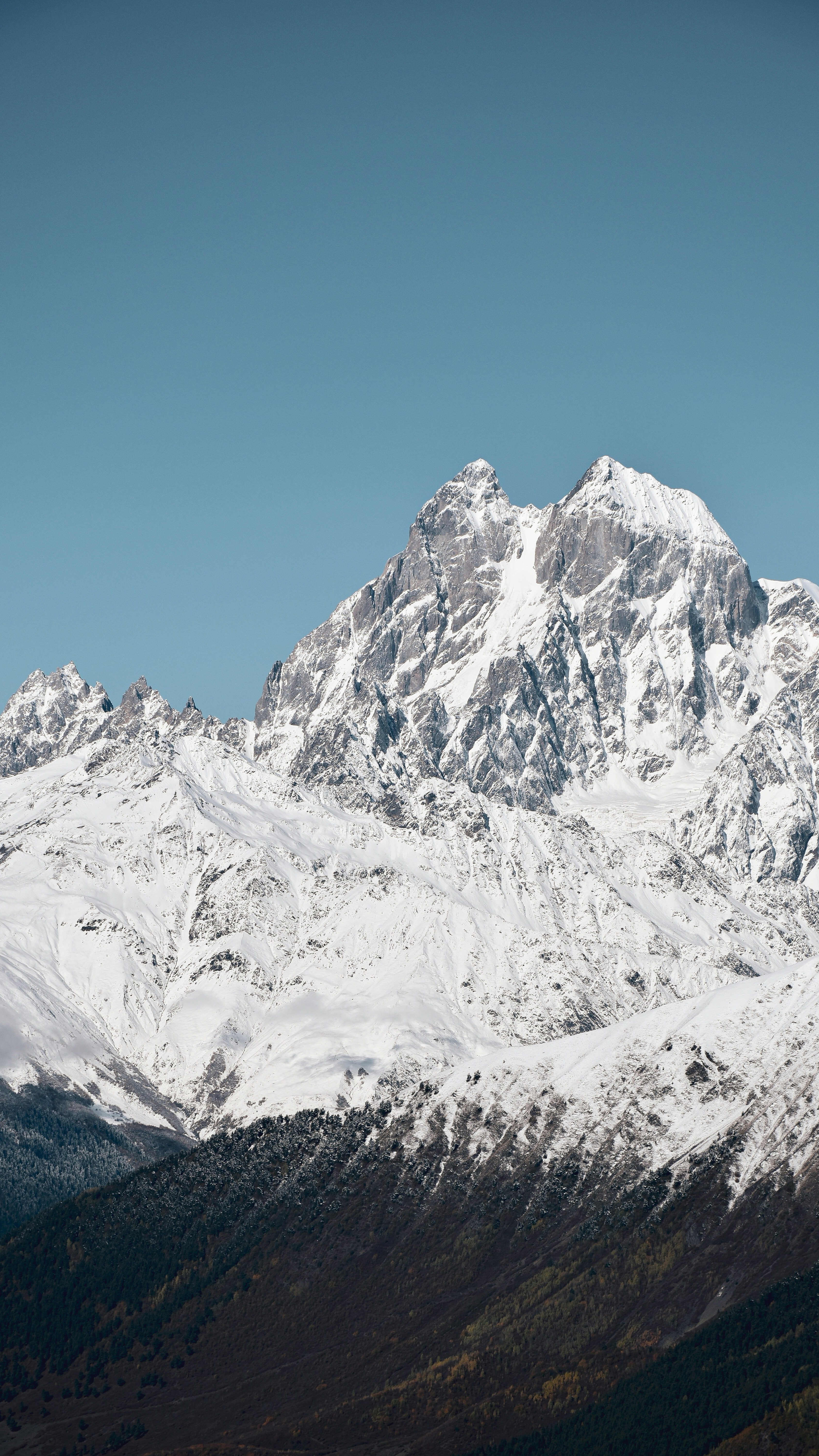 Snow-Capped Mountains Under Clear Sky