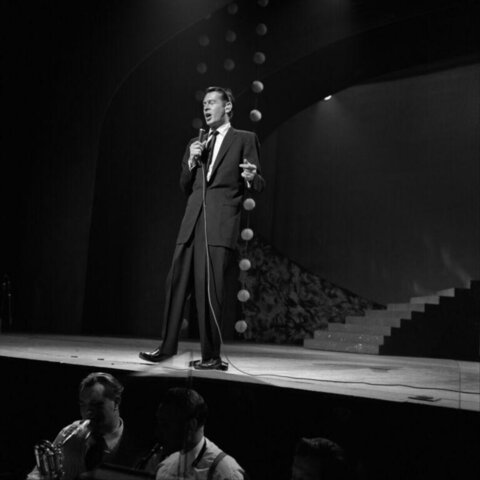 Male Singer Performing On Stage