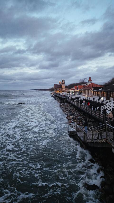 Stormy Coastal Promenade at Dusk
