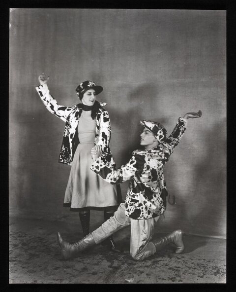 Two Dancers in Matching Cow Print Outfits