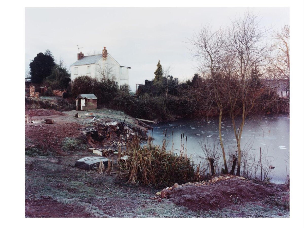 Frozen Rural Pond by Country House