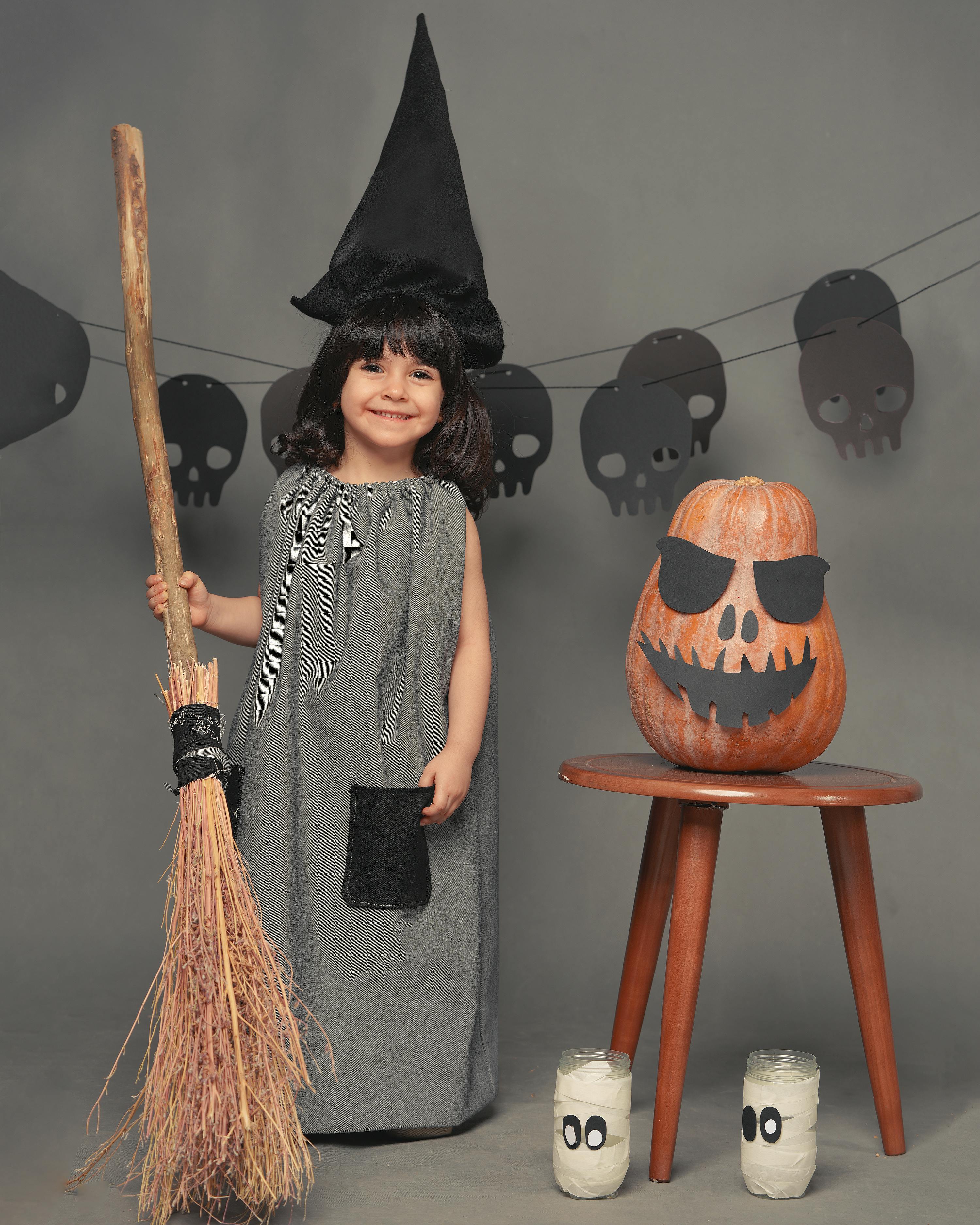 Girl in Halloween Witch Costume
