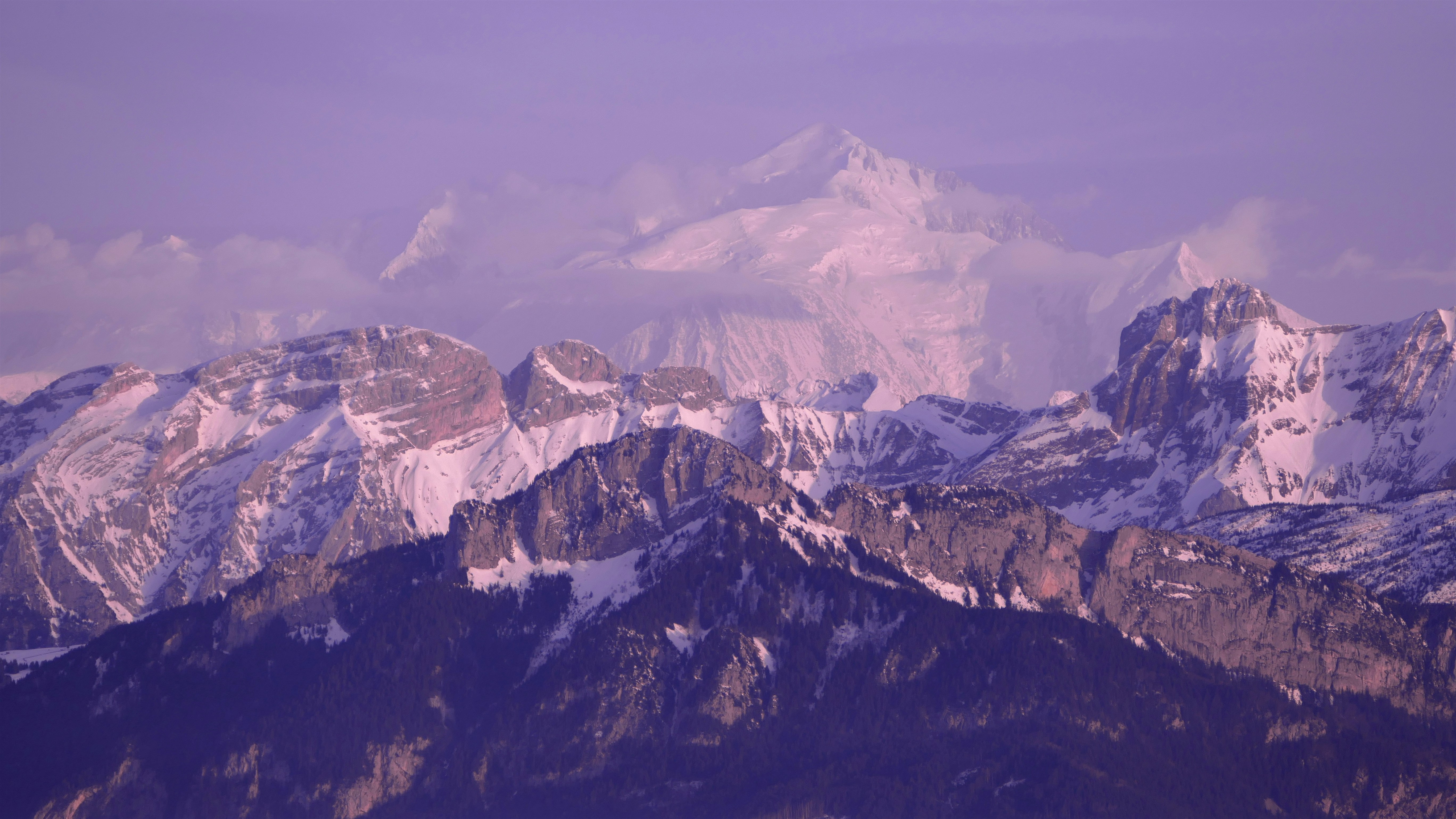 Layered Snow-capped Mountain Range