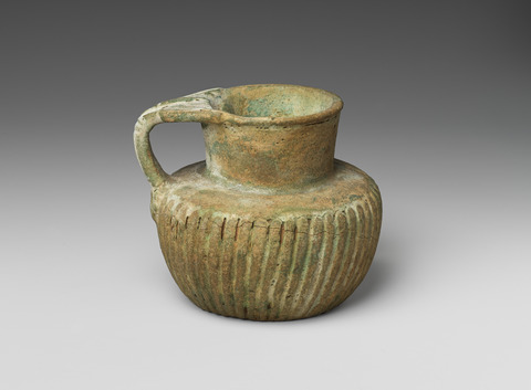 Ancient Glazed Ribbed Ceramic Pitcher