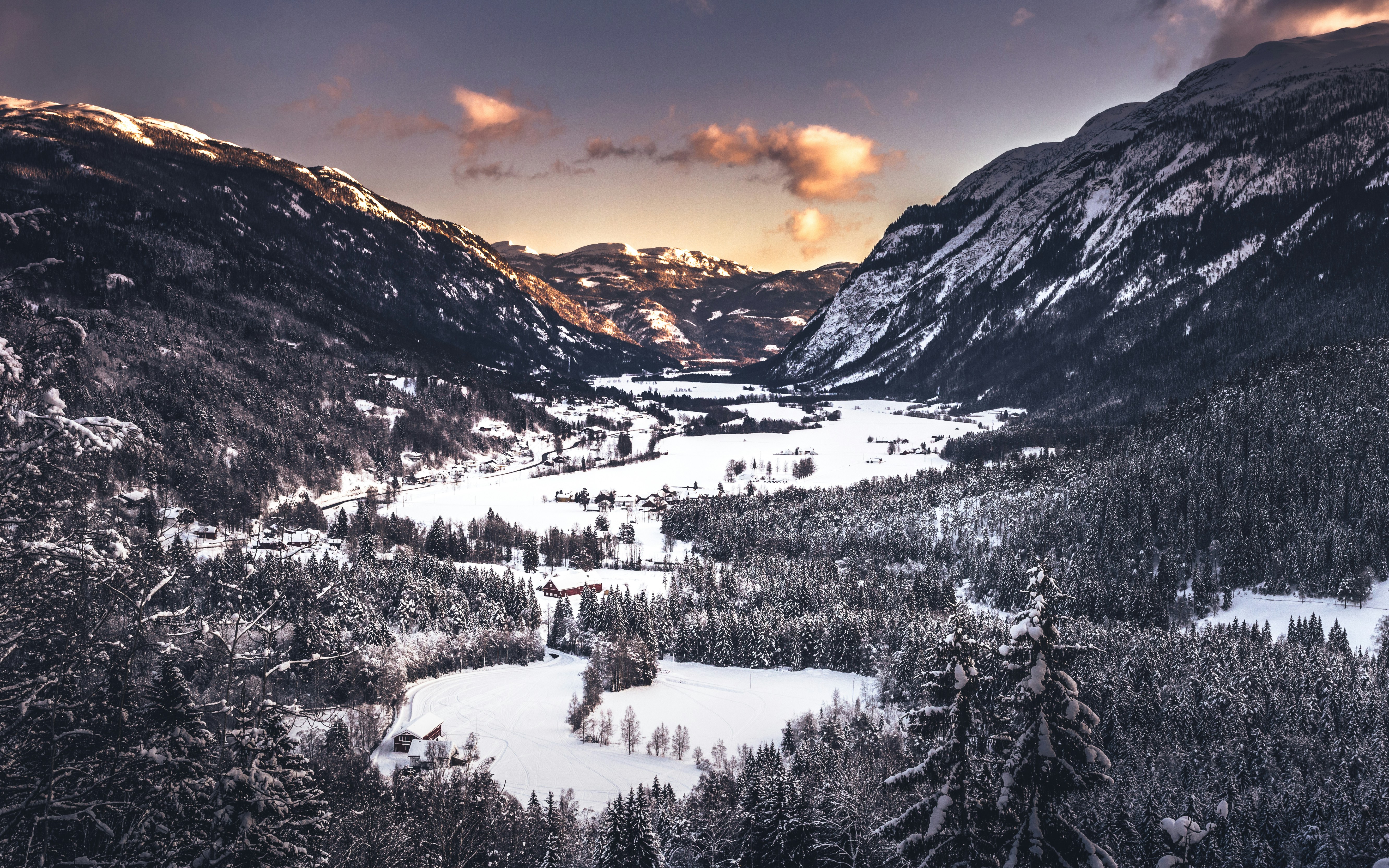 Sunlit Snowy Mountain Valley