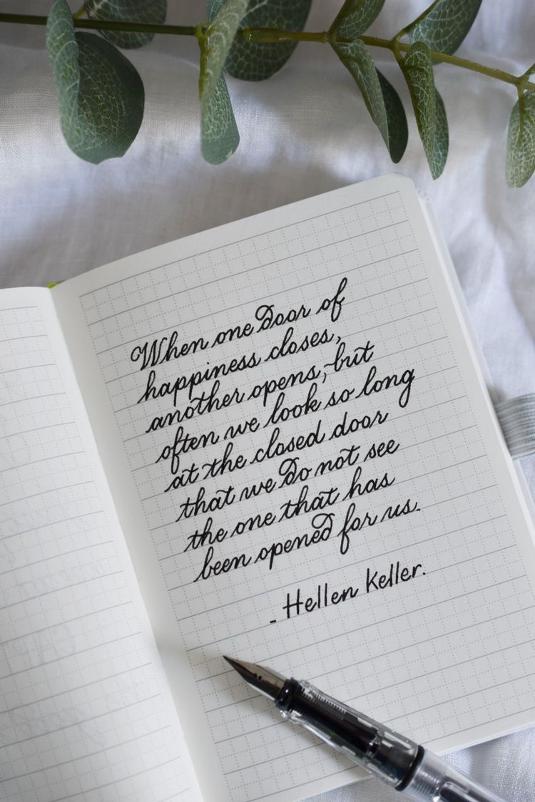 Handwritten Helen Keller Quote in Notebook